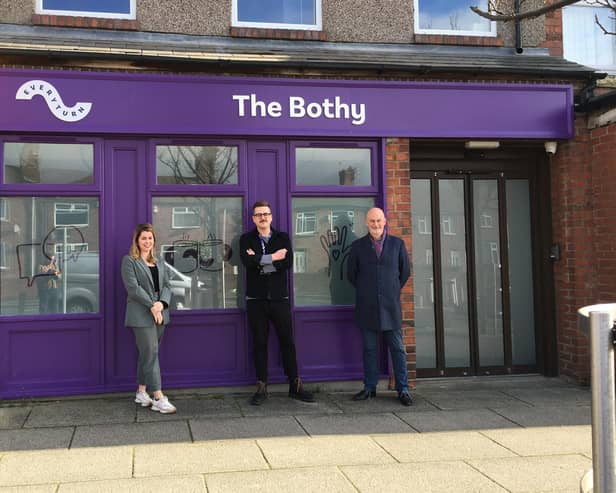 Everyturn chief executive Adam Crampsie (centre), pictured outside The Bothy in Ashington, has criticised the government. (Photo by Everyturn)