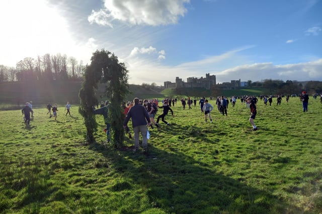 Match action in the shadow of Alnwick Castle.