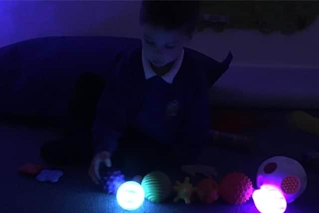 A pupil at William Leech C of E Primary School enjoying the new early years sensory suite.