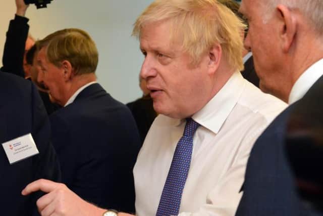 Prime Minister Boris Johnson, pictured on a visit to the North East earlier this year, has tested positive for coronavirus.
