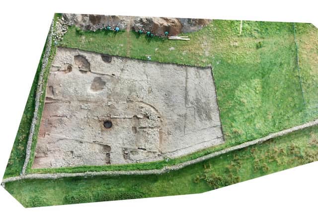 Aerial image of the Milecastle 46 with well (centre) and pits.
