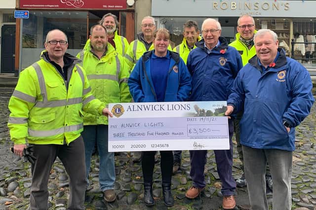 Alnwick Lions have presented a cheque for £3,500 to the town's lights committee.