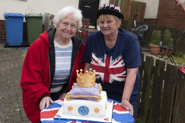 Sheila Hedley and Elspeth Dodds are seen with the fantastic Jubilee cake Sheila made.