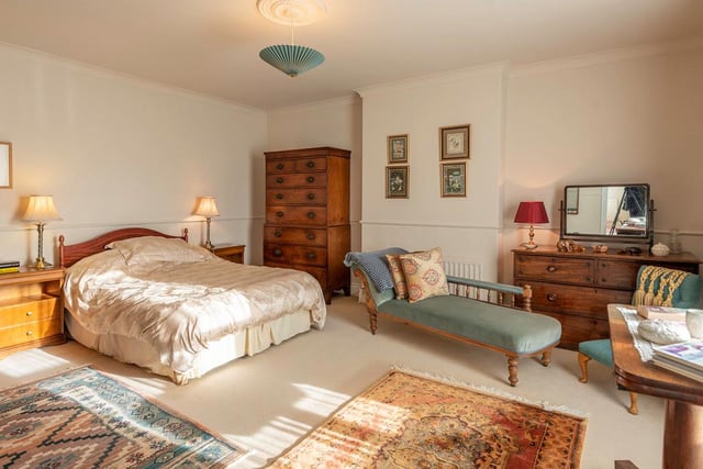 Upstairs are four spacious double bedrooms, two with ensuite facilities.