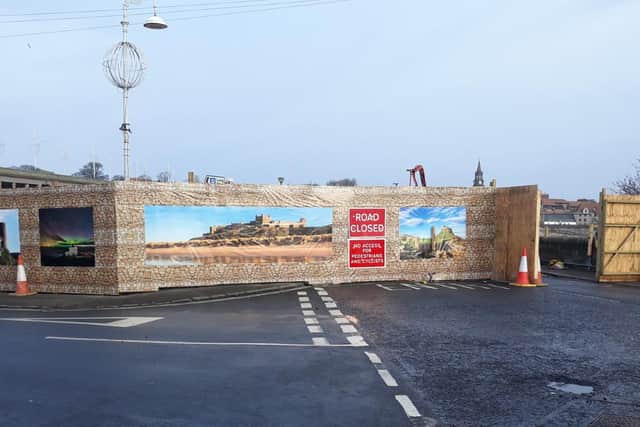 The new-look hoardings feature local landmarks.