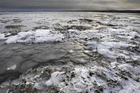 Ice by the causeway to Holy Island. File image.