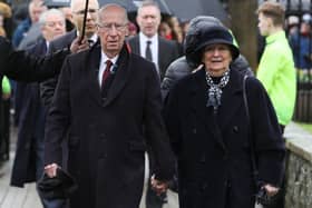 Sir Bobby Charlton and wife Lady Norma pictured in February this year as they attended the funeral of former Manchester United and Northern Ireland player Harry Gregg. Photo by Getty Images.