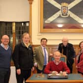 The signing of the Tweed Valley Railway Campaign constitution at Kelso Town Hall in October 2021.