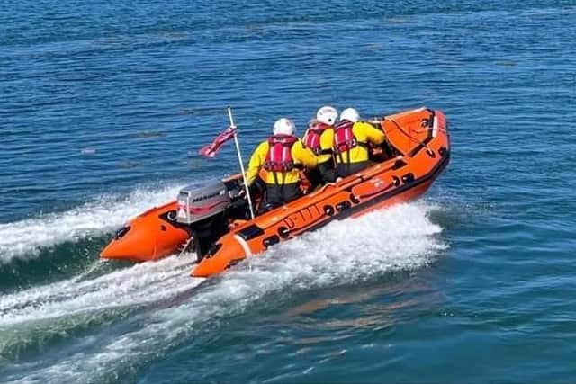 Berwick-upon-Tweed RNLI on their way to Spittal beach - helmsman Michael Percy and crew Amy Faragher and Paul Smith.