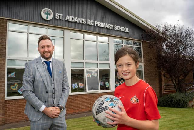 Lily Williamson with her headteacher Michael Moran.