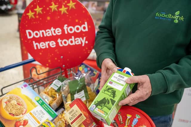 Some supermarkets have areas where shoppers can donate supplies to food banks.