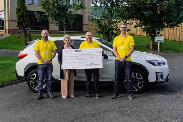 Pictured at the cheque presentation, from left, are Andrew Smith (Berwick Cancer Cars), Carol Bruce, David Cowan (Berwick Cancer Cars) and Roger Peaple.