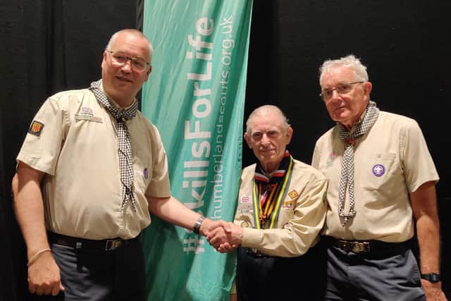 From left, Peter Thorp (County Commissioner), Francis Walker and Prof Sir Alan Craft (County Chairman).