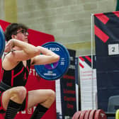 Charlie van Loon takes part in the clean and jerk at the English National Championships. Picture: Grip and Rip