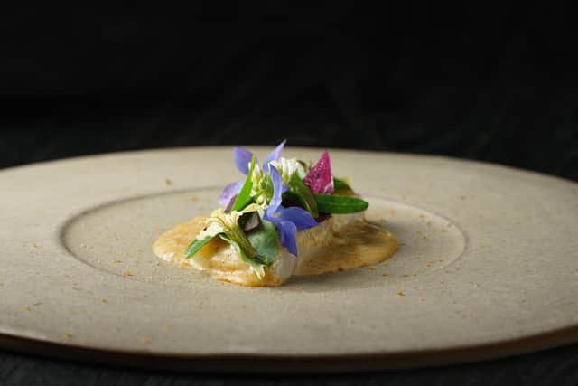 Steamed plaice with a sauce made fermented and smoked scallop,horseradish and garden and coastal herbs.