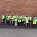 Reception students at Bedlington West End Primary School ready to start their litter pick.
