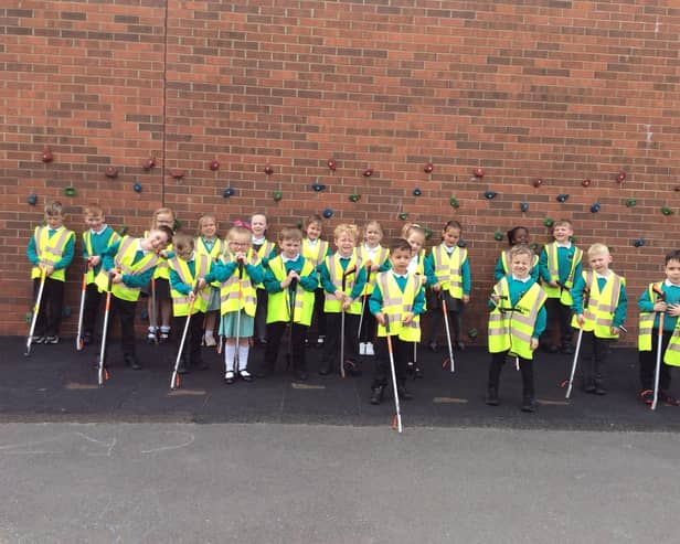 Reception students at Bedlington West End Primary School ready to start their litter pick.