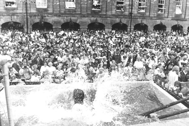 The wench ducking was always a popular part of Alnwick Fair. Here, the Market Place is packed.