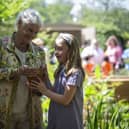 Dame Judi Dench and school competition winner Charlotte Crowe place Sycamore Gap seedling in The Octavia Hill Garden at Chelsea Flower Show. Picture: National Trust/James Dobson.