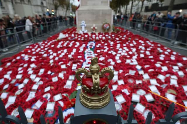 Poppy wreaths laid at The Cenotaph war memorial, London, for the National Service Of Remembrance in 2021. Picture: Hollie Adams/Getty Images.