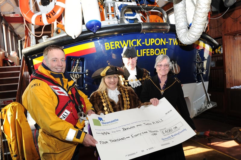 Robert Frost collects a cheque from the civic party for the RNLI in Berwick after being the Mayor's chosen charity by retiring Mayor Hazel Bettison, Sheriff Ian Hay, and Sheriff's Lady Maud Hay.