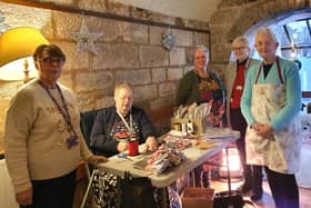 Manager Stella McLaren and some of the volunteers at the 'Christmas Presence' in Berwick. Picture by Margaret Shaw.