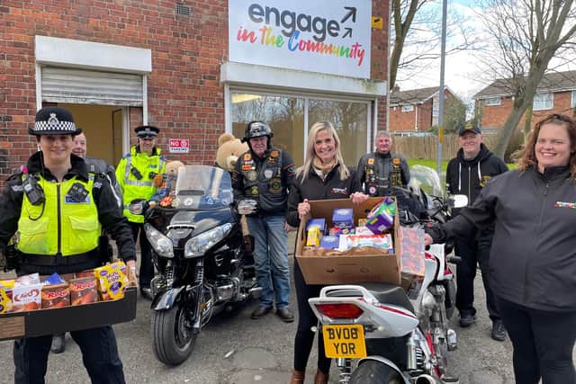 Julie Butler, chair of Engage in the Community Blyth, with the bikers and Northumbria Police.