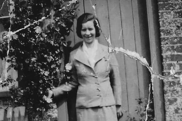 Alice at the rose-covered cottage in 1935.