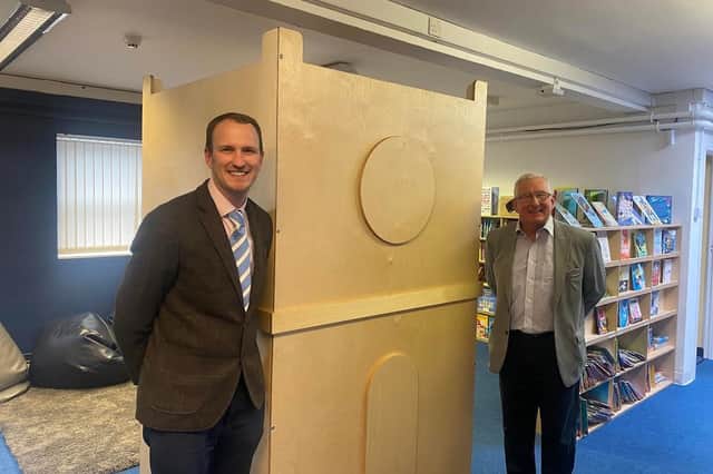 Glen Whitehead, left, and Coun John Beynon in Stobhillgate First School's updated library.