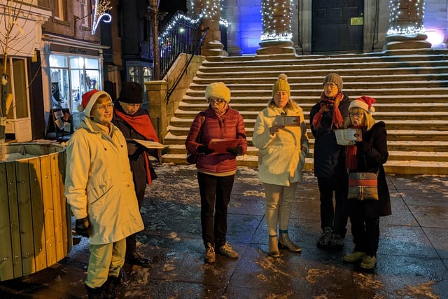 There was some festive carol singing led by the Thursday Singers.