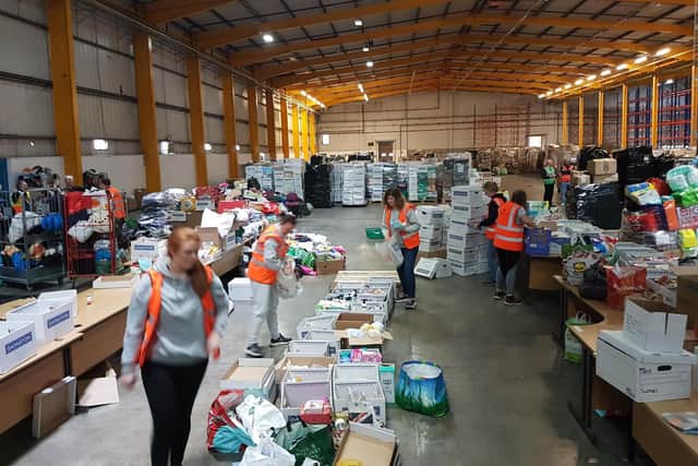 Volunteers sorting donations from Northumberland residents which are being sent to Poland.