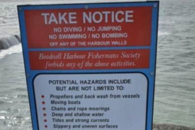 Safety signage at Beadnell harbour.
