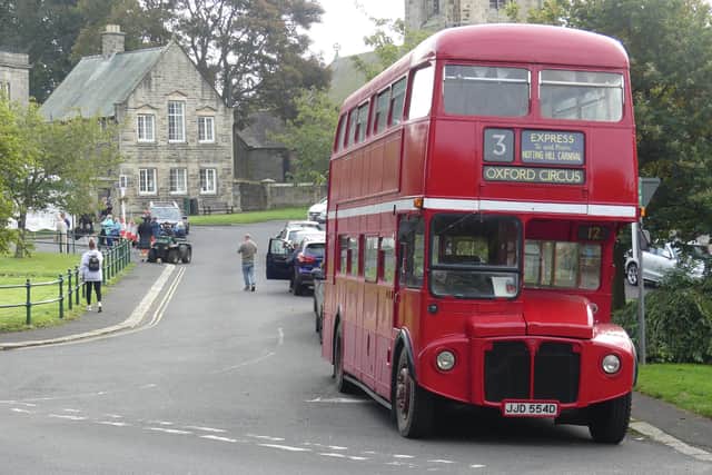 The band used a double-decker vintage red bus for the tour. Picture by Jeff Reynalds.