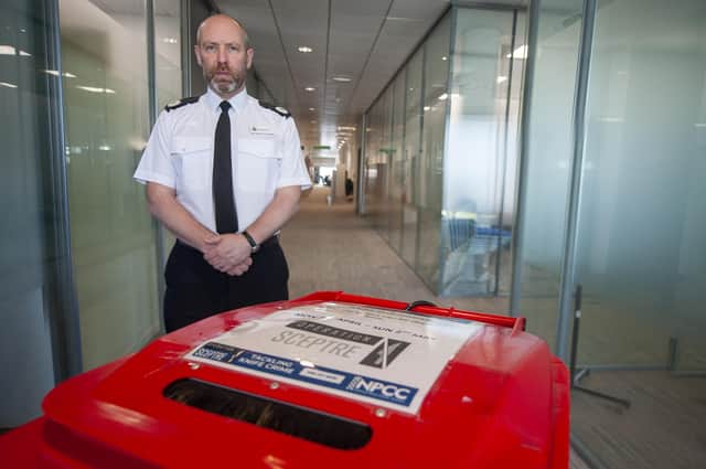 Northumbria Police Assistant Chief Constable Neil Hutchison with one of the knife surrender bins.