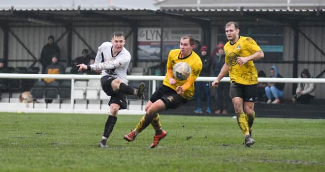 Karl Ross strikes and scores for Ashington. Picture: Ian Brodie