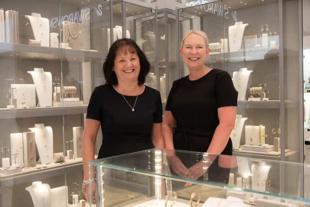 Assistant store manager Shelley Turner, left, and store manager Catherine Rigg.