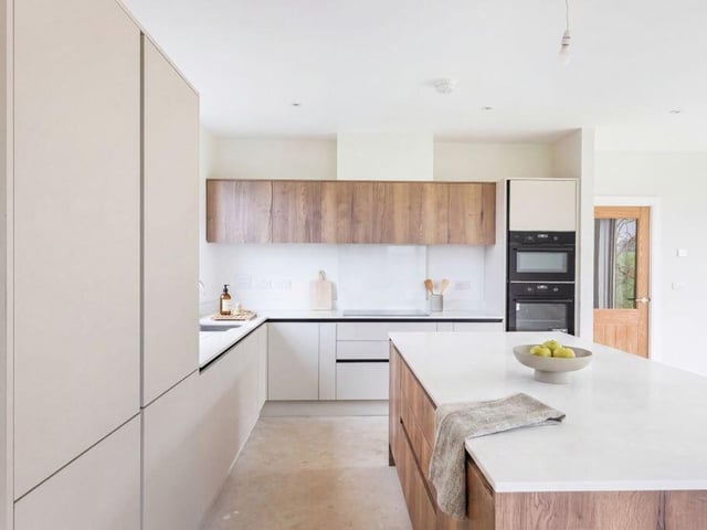 The kitchen has been designed with modern, Scandinavian-style features.