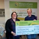Julie Newton and Tara Grey hand over their cheque to Emma Arthur of HospiceCare North Northumberland.