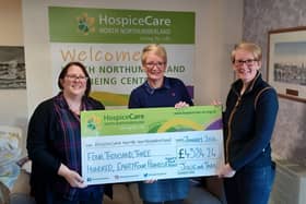 Julie Newton and Tara Grey hand over their cheque to Emma Arthur of HospiceCare North Northumberland.