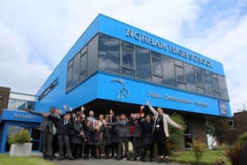 A group of Norham High School pupils and staff celebrate the very positive Ofsted report.