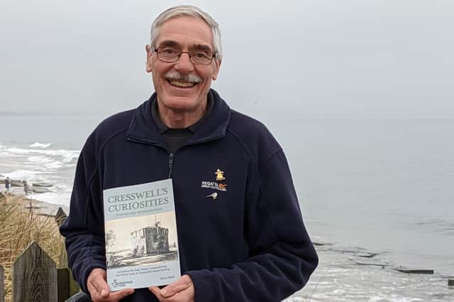 Barry Mead pictured with a copy of his book, Cresswell’s Curiosities.
