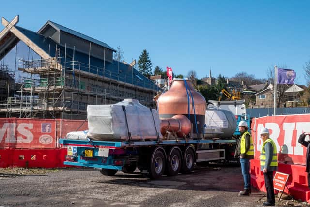 The giant copper stills arrive at the whisky distillery site.