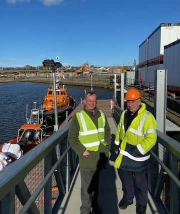 Council leader Peter Jackson with Berwick Harbour Commission chief executive Alan Irving.