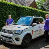 Members of the hospice's team arrive at a client's home.