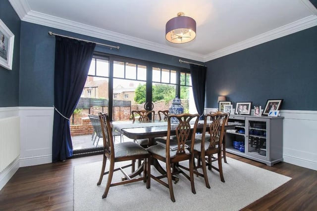 The open plan dining room also benefits from sliding doors giving access to the rear garden.