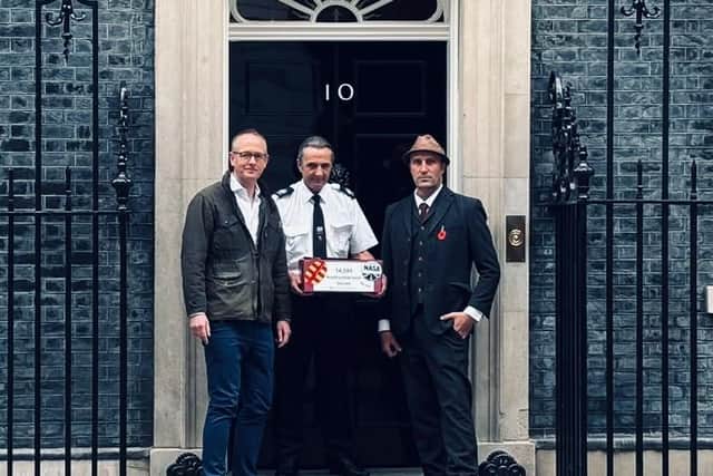 John Lamont MP and Kezz Petronelli-Stone delivering an A1 dualling petition to Downing Street.