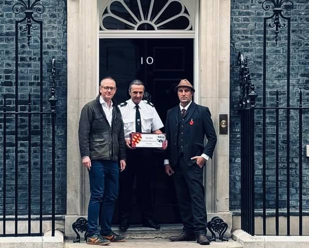 John Lamont MP and Kezz Petronelli-Stone delivering an A1 dualling petition to Downing Street.