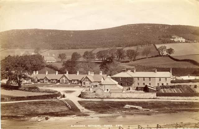 An early photograph of the Alms cottages. Note the lack of stepping stones.