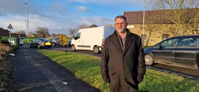 Councillor Mark Swinburn in Cramlington town centre, which is backed up with traffic at peak times due to long-running roadworks.