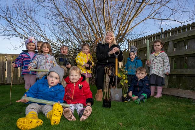 Cllr Wendy Pattison with children from Spring Nursery.